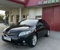Чорний Тойота Королла, об'ємом двигуна 1.6 л та пробігом 275 тис. км за 8000 $, фото 1 на Automoto.ua