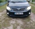 Чорний Тойота Королла, об'ємом двигуна 1.33 л та пробігом 182 тис. км за 6200 $, фото 1 на Automoto.ua