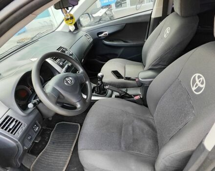 Черный Тойота Королла, объемом двигателя 1.33 л и пробегом 219 тыс. км за 6000 $, фото 2 на Automoto.ua