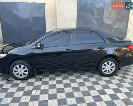 Черный Тойота Королла, объемом двигателя 1.3 л и пробегом 145 тыс. км за 8200 $, фото 2 на Automoto.ua