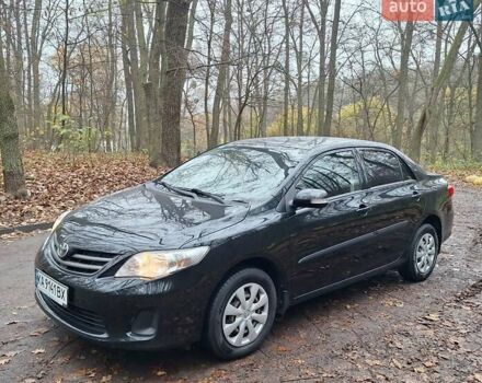 Черный Тойота Королла, объемом двигателя 1.33 л и пробегом 119 тыс. км за 8000 $, фото 1 на Automoto.ua