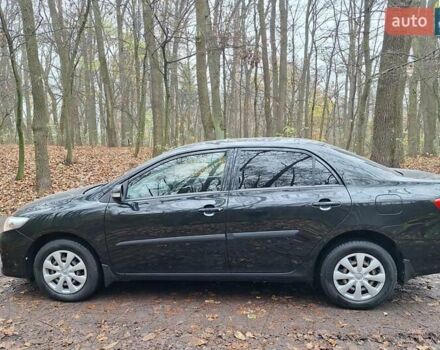 Черный Тойота Королла, объемом двигателя 1.33 л и пробегом 119 тыс. км за 8000 $, фото 2 на Automoto.ua