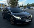 Черный Тойота Королла, объемом двигателя 1.36 л и пробегом 235 тыс. км за 7000 $, фото 1 на Automoto.ua