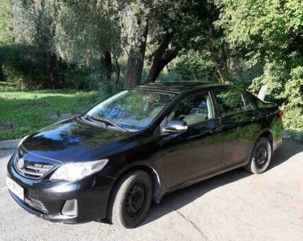 Чорний Тойота Королла, об'ємом двигуна 1.3 л та пробігом 115 тис. км за 6200 $, фото 2 на Automoto.ua