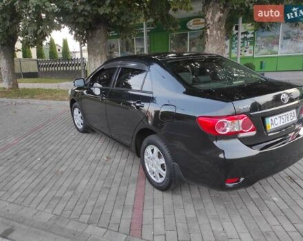 Черный Тойота Королла, объемом двигателя 1.33 л и пробегом 151 тыс. км за 7000 $, фото 1 на Automoto.ua