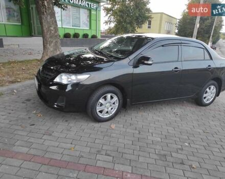 Черный Тойота Королла, объемом двигателя 1.33 л и пробегом 151 тыс. км за 7000 $, фото 2 на Automoto.ua