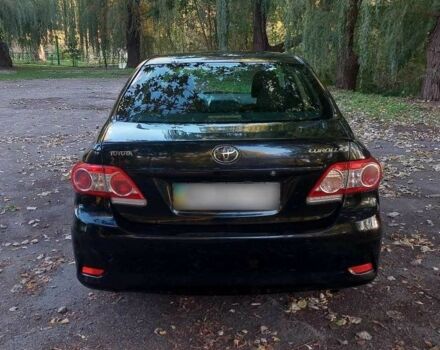 Черный Тойота Королла, объемом двигателя 1.3 л и пробегом 115 тыс. км за 5499 $, фото 4 на Automoto.ua