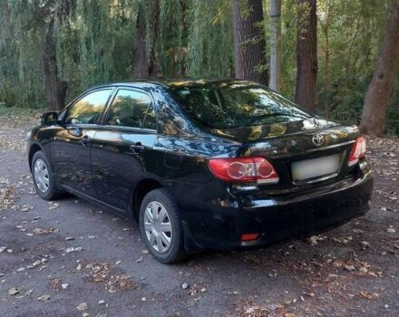 Черный Тойота Королла, объемом двигателя 1.3 л и пробегом 115 тыс. км за 5499 $, фото 5 на Automoto.ua