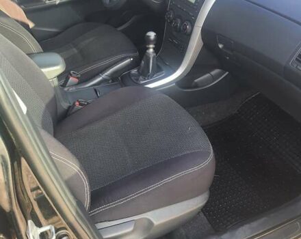 Черный Тойота Королла, объемом двигателя 1.33 л и пробегом 176 тыс. км за 8500 $, фото 19 на Automoto.ua