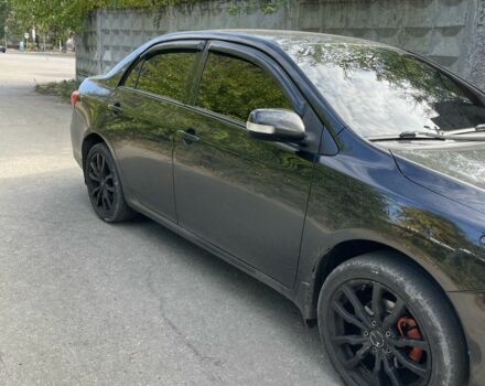 Черный Тойота Королла, объемом двигателя 1.3 л и пробегом 228 тыс. км за 7200 $, фото 3 на Automoto.ua