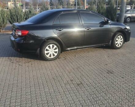 Черный Тойота Королла, объемом двигателя 1.33 л и пробегом 176 тыс. км за 8500 $, фото 22 на Automoto.ua