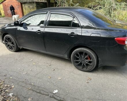 Черный Тойота Королла, объемом двигателя 1.3 л и пробегом 228 тыс. км за 7200 $, фото 1 на Automoto.ua