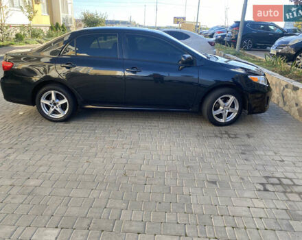 Черный Тойота Королла, объемом двигателя 1.8 л и пробегом 299 тыс. км за 10500 $, фото 2 на Automoto.ua