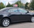 Черный Тойота Королла, объемом двигателя 1.6 л и пробегом 105 тыс. км за 8900 $, фото 1 на Automoto.ua