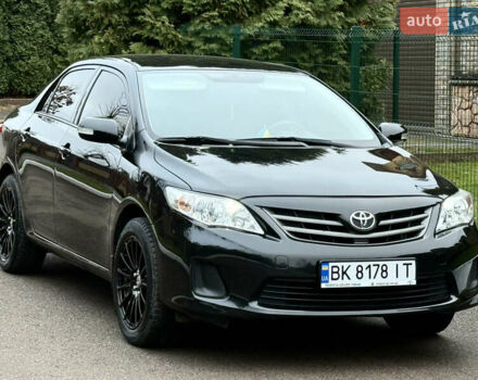Черный Тойота Королла, объемом двигателя 1.4 л и пробегом 235 тыс. км за 7350 $, фото 1 на Automoto.ua