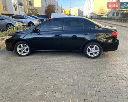 Черный Тойота Королла, объемом двигателя 1.8 л и пробегом 299 тыс. км за 10500 $, фото 4 на Automoto.ua