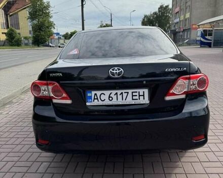 Черный Тойота Королла, объемом двигателя 1.33 л и пробегом 238 тыс. км за 9500 $, фото 2 на Automoto.ua
