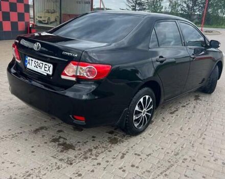 Чорний Тойота Королла, об'ємом двигуна 1.33 л та пробігом 220 тис. км за 6000 $, фото 9 на Automoto.ua