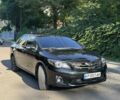 Чорний Тойота Королла, об'ємом двигуна 1.3 л та пробігом 244 тис. км за 7273 $, фото 1 на Automoto.ua