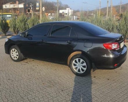 Черный Тойота Королла, объемом двигателя 1.33 л и пробегом 176 тыс. км за 8500 $, фото 28 на Automoto.ua