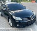Черный Тойота Королла, объемом двигателя 1.6 л и пробегом 187 тыс. км за 11700 $, фото 1 на Automoto.ua