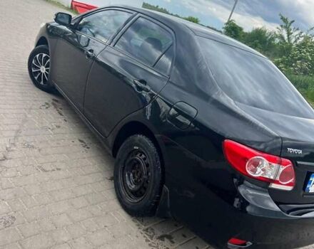 Чорний Тойота Королла, об'ємом двигуна 1.33 л та пробігом 220 тис. км за 6000 $, фото 4 на Automoto.ua