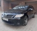 Черный Тойота Королла, объемом двигателя 1.6 л и пробегом 141 тыс. км за 9500 $, фото 1 на Automoto.ua