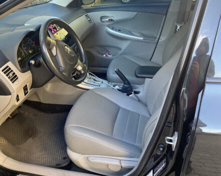 Черный Тойота Королла, объемом двигателя 1.8 л и пробегом 299 тыс. км за 10500 $, фото 6 на Automoto.ua