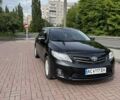 Черный Тойота Королла, объемом двигателя 1.33 л и пробегом 238 тыс. км за 9500 $, фото 1 на Automoto.ua