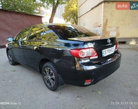 Чорний Тойота Королла, об'ємом двигуна 1.33 л та пробігом 124 тис. км за 7200 $, фото 7 на Automoto.ua