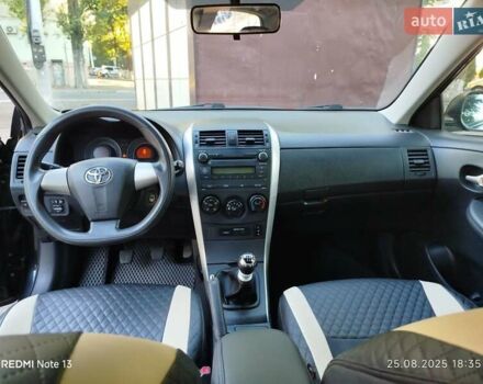 Чорний Тойота Королла, об'ємом двигуна 1.33 л та пробігом 124 тис. км за 7200 $, фото 8 на Automoto.ua