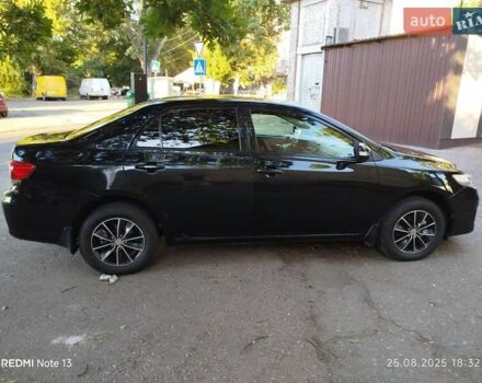 Чорний Тойота Королла, об'ємом двигуна 1.33 л та пробігом 124 тис. км за 7200 $, фото 3 на Automoto.ua