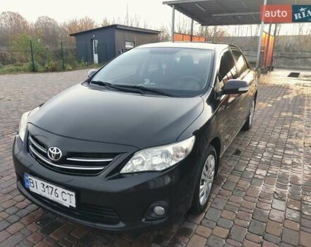 Черный Тойота Королла, объемом двигателя 1.6 л и пробегом 244 тыс. км за 8400 $, фото 2 на Automoto.ua