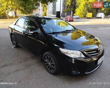 Чорний Тойота Королла, об'ємом двигуна 1.33 л та пробігом 124 тис. км за 7200 $, фото 2 на Automoto.ua