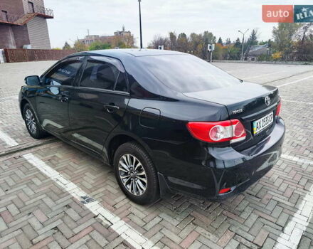 Чорний Тойота Королла, об'ємом двигуна 1.3 л та пробігом 172 тис. км за 9000 $, фото 3 на Automoto.ua