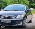 Чорний Тойота Королла, об'ємом двигуна 1.6 л та пробігом 83 тис. км за 9400 $, фото 1 на Automoto.ua