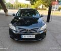 Чорний Тойота Королла, об'ємом двигуна 1.33 л та пробігом 124 тис. км за 7200 $, фото 1 на Automoto.ua