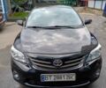Черный Тойота Королла, объемом двигателя 1.3 л и пробегом 167 тыс. км за 9000 $, фото 1 на Automoto.ua