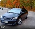 Черный Тойота Королла, объемом двигателя 1.6 л и пробегом 137 тыс. км за 9750 $, фото 1 на Automoto.ua