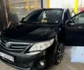 Чорний Тойота Королла, об'ємом двигуна 1.6 л та пробігом 215 тис. км за 10500 $, фото 1 на Automoto.ua