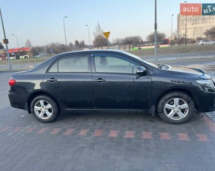 Черный Тойота Королла, объемом двигателя 1.3 л и пробегом 290 тыс. км за 7300 $, фото 2 на Automoto.ua