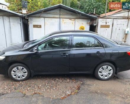 Черный Тойота Королла, объемом двигателя 1.6 л и пробегом 111 тыс. км за 8000 $, фото 1 на Automoto.ua