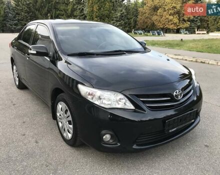 Чорний Тойота Королла, об'ємом двигуна 1.6 л та пробігом 165 тис. км за 10799 $, фото 3 на Automoto.ua