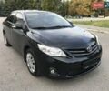 Чорний Тойота Королла, об'ємом двигуна 1.6 л та пробігом 165 тис. км за 10799 $, фото 3 на Automoto.ua