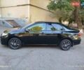 Чорний Тойота Королла, об'ємом двигуна 1.33 л та пробігом 124 тис. км за 7200 $, фото 4 на Automoto.ua