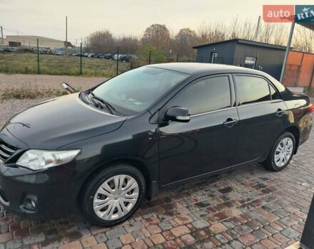 Черный Тойота Королла, объемом двигателя 1.6 л и пробегом 244 тыс. км за 8400 $, фото 1 на Automoto.ua