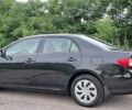 Черный Тойота Королла, объемом двигателя 1.6 л и пробегом 83 тыс. км за 9400 $, фото 1 на Automoto.ua