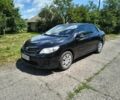 Чорний Тойота Королла, об'ємом двигуна 1.6 л та пробігом 136 тис. км за 8575 $, фото 1 на Automoto.ua