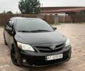 Чорний Тойота Королла, об'ємом двигуна 1.8 л та пробігом 113 тис. км за 8800 $, фото 1 на Automoto.ua