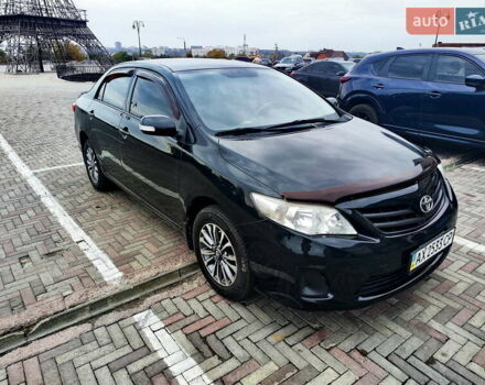Чорний Тойота Королла, об'ємом двигуна 1.3 л та пробігом 172 тис. км за 9000 $, фото 1 на Automoto.ua